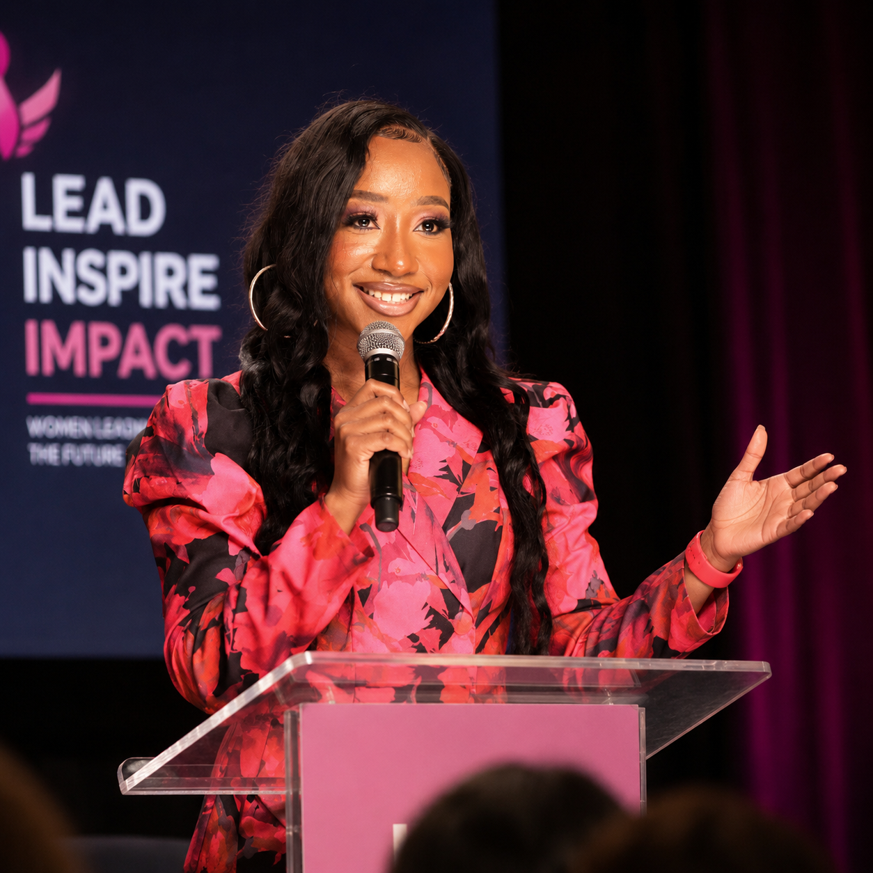 Founder speaking on stage at a workforce and tech conference